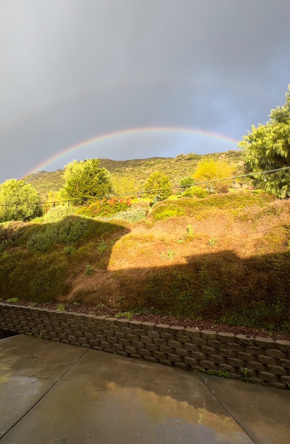 Rainbow over East County hills